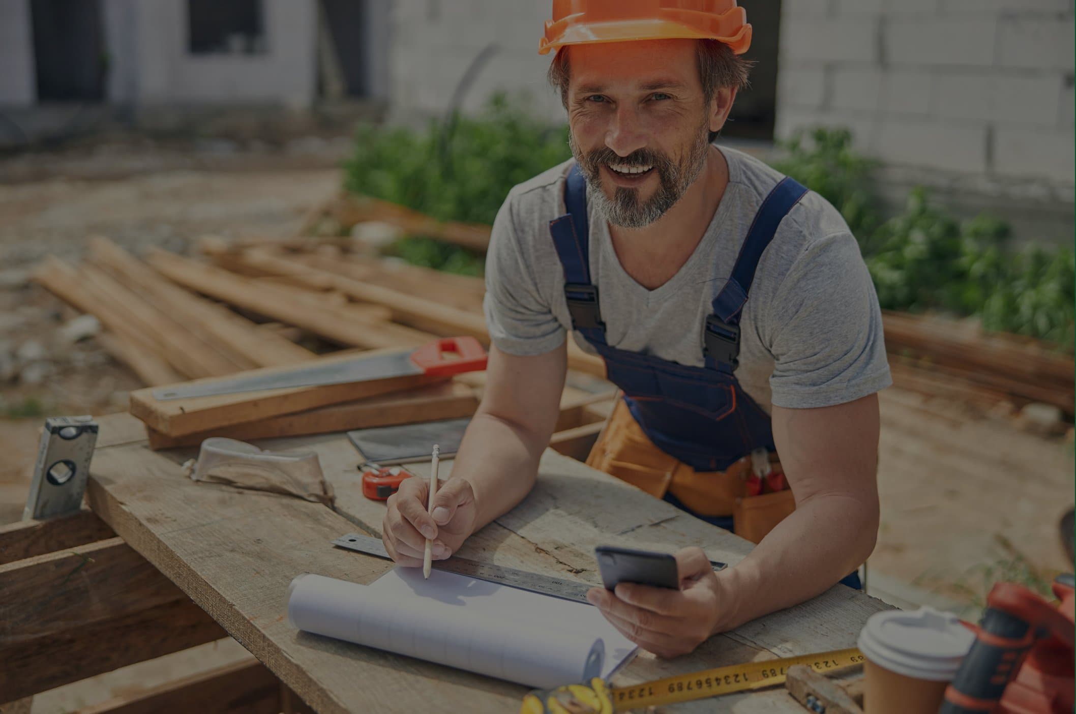 A builder reviewing renovation plans